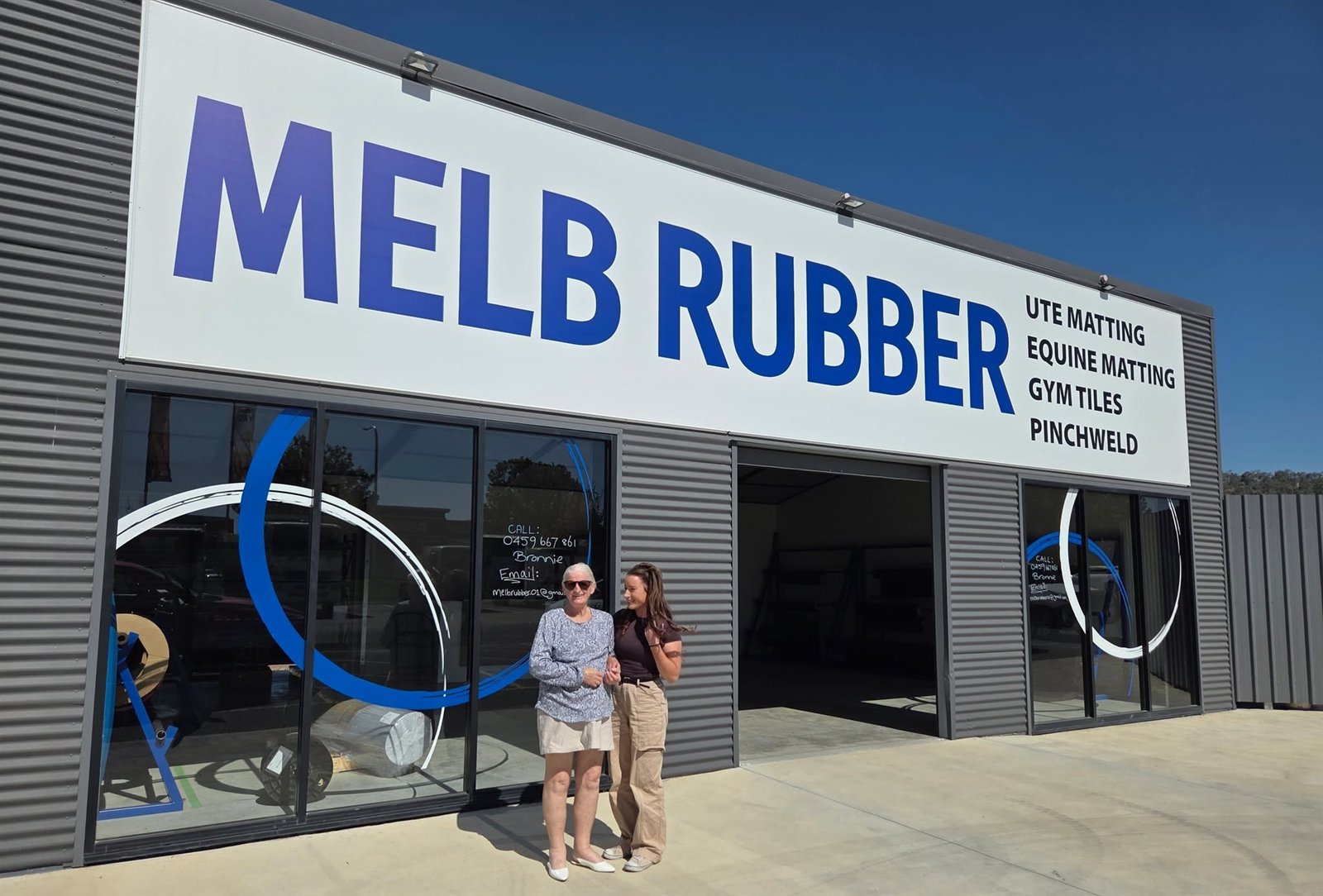 The MELB Rubber family outside the Albury shop