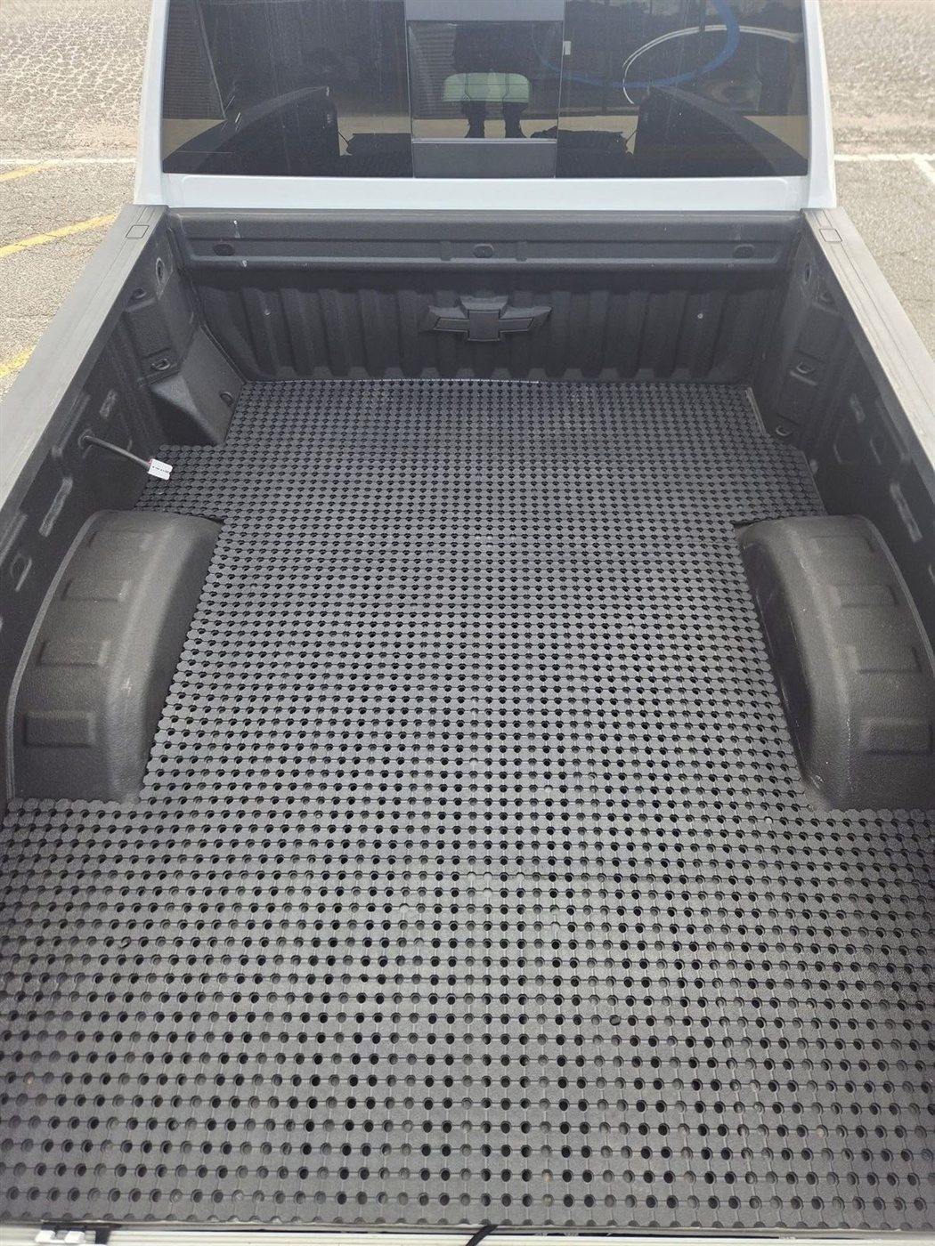 Ute tub fitted with honeycomb rubber matting
