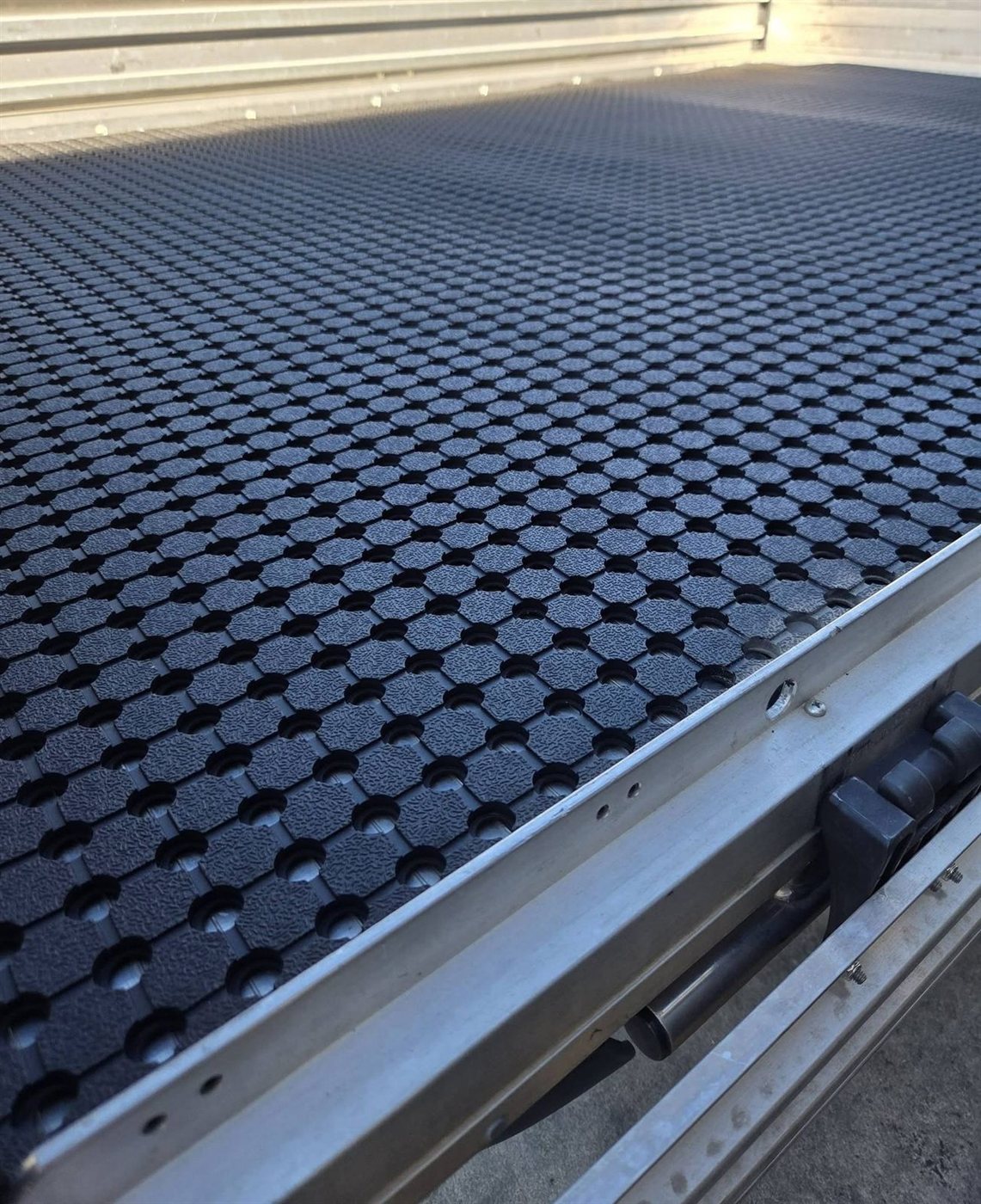 Close-up of honeycomb ute tray matting