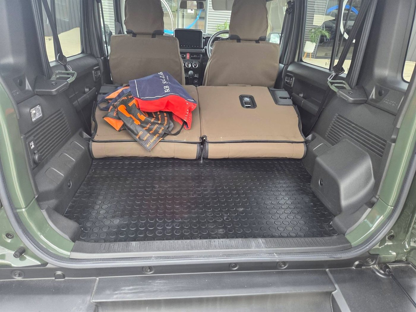 Vehicle cargo area rubber boot mat